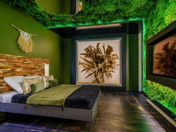 Love Room Evasion Duo : photo 3 de la chambre suite avec piscine privée