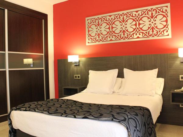 Hotel Venecia : photo 1 de la chambre chambre standard lit queen-size