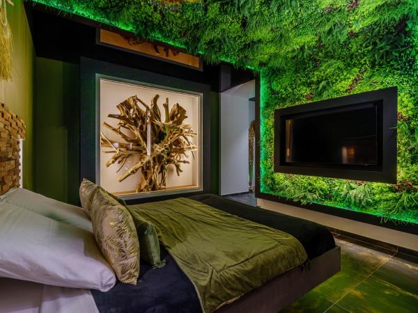 Love Room Evasion Duo : photo 4 de la chambre suite avec piscine privée