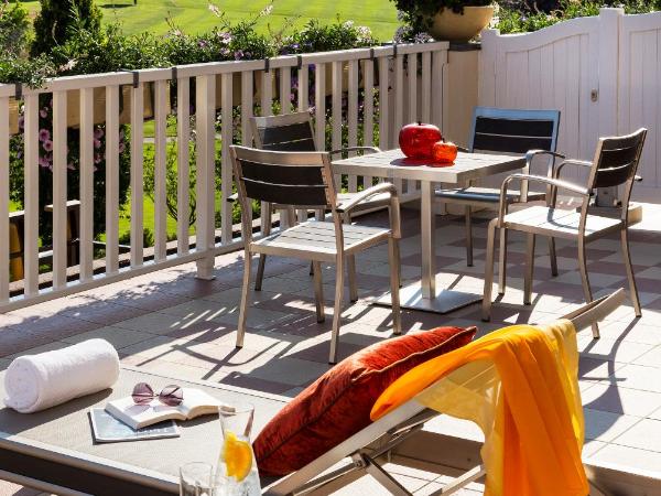 Hôtel Barrière L'Hôtel du Golf : photo 1 de la chambre suite junior avec terrasse