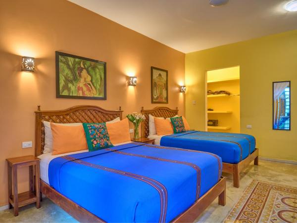 Casa Del Maya Bed & Breakfast : photo 1 de la chambre chambre avec 2 grands lits queen-size 