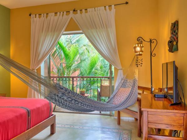 Casa Del Maya Bed & Breakfast : photo 2 de la chambre chambre lit queen-size avec balcon
