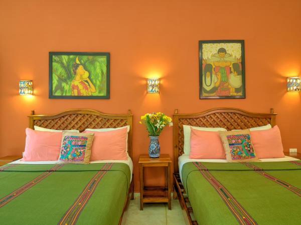 Casa Del Maya Bed & Breakfast : photo 1 de la chambre chambre avec 2 grands lits queen-size 