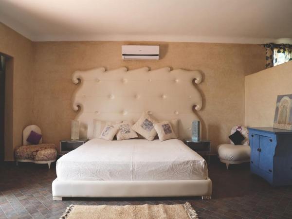 Maison d'Hôtes à Marrakech : photo 2 de la chambre chambre lit king-size - vue sur jardin