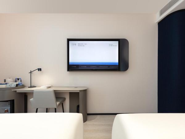 Atour Light Hotel Wuxi Taihu Lake Expo Center Financial Street : photo 2 de la chambre chambre supérieure lit queen-size