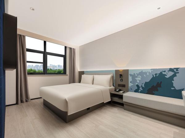 Atour Light Hotel Wuxi Taihu Lake Expo Center Financial Street : photo 2 de la chambre chambre lit queen-size confort