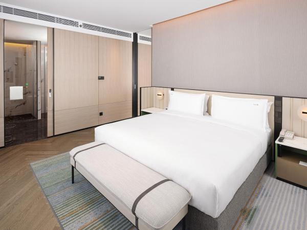 Holiday Inn & Suites Qingdao Jinshui, an IHG Hotel : photo 1 de la chambre suite 1 chambre