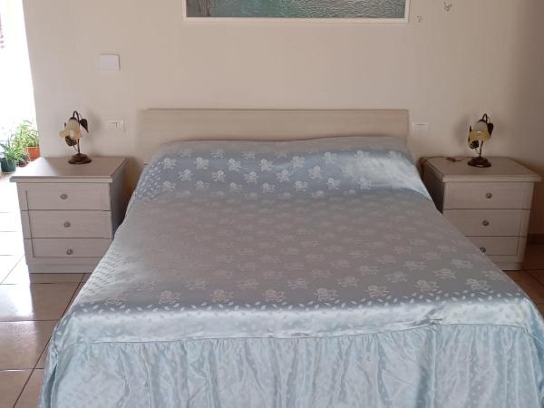 L' Arcangelo-Locazione Turistica : photo 1 de la chambre grande chambre double