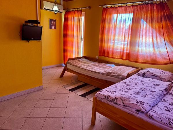 Széplak apartman : photo 3 de la chambre chambre triple - vue sur lac
