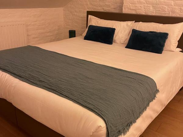 Maison Noppius : photo 6 de la chambre suite deluxe avec lit king-size