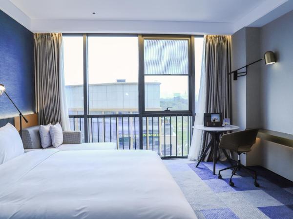 Novotel Dongguan Songshan : photo 3 de la chambre chambre lit king-size standard