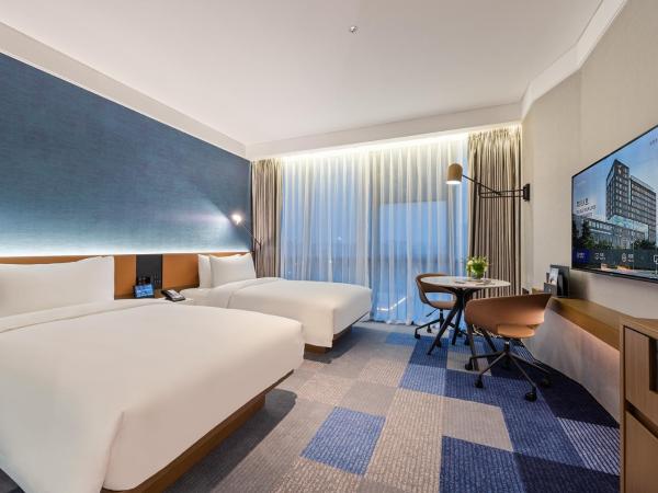 Novotel Dongguan Songshan : photo 1 de la chambre chambre lits jumeaux standard