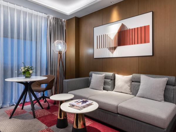 Novotel Dongguan Songshan : photo 4 de la chambre suite lit king-size privilège