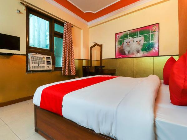 OYO G L Palace : photo 2 de la chambre chambre triple classique