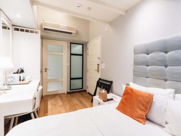 Hotel NuVe Heritage : photo 2 de la chambre hébergement lit queen-size pittoresque sans fenêtre