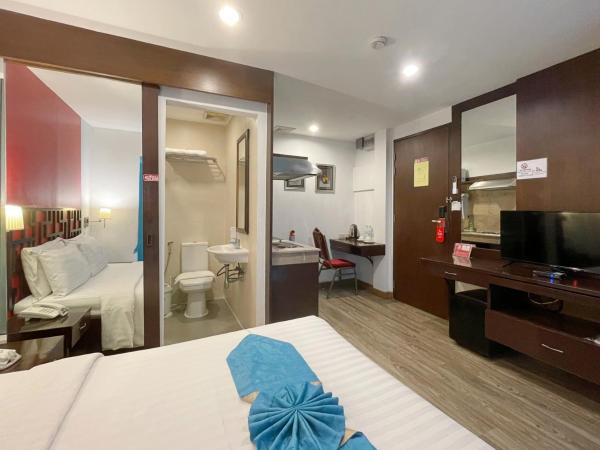 Arawana Express Chinatown : photo 2 de la chambre hébergement queen-size de luxe avec balcon