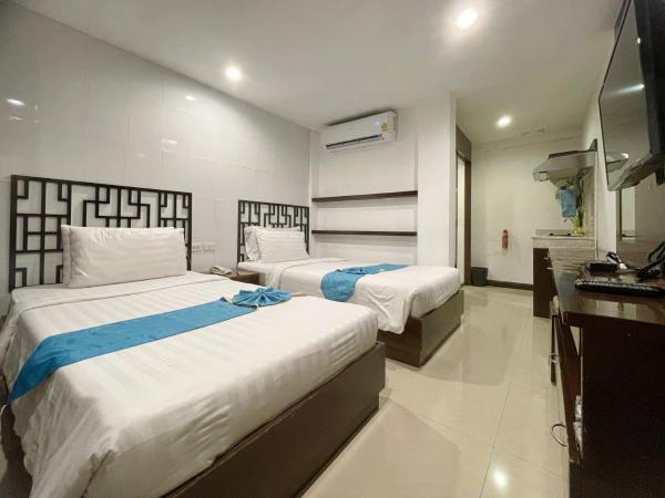 Arawana Express Chinatown : photo 3 de la chambre chambre lits jumeaux de luxe (sans fenêtre)