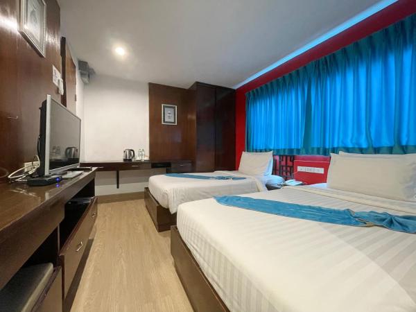 Arawana Express Chinatown : photo 7 de la chambre chambre lits jumeaux de luxe avec fenêtre