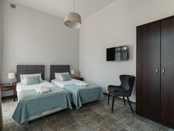 Rewita Korab : photo 2 de la chambre chambre quadruple