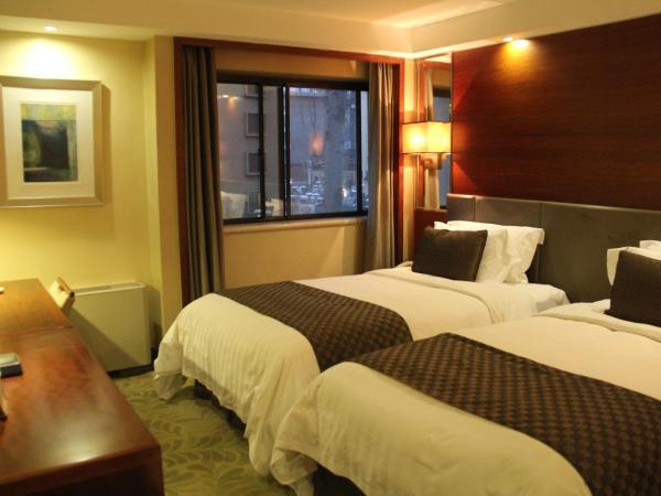 Jianguo Hotel Xi'an : photo 1 de la chambre chambre lits jumeaux supérieure
