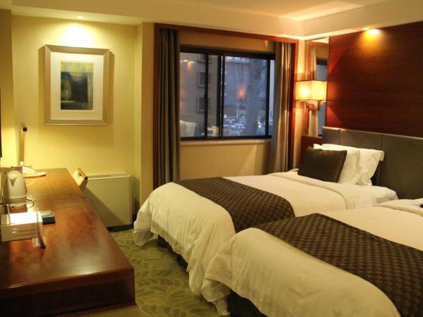 Jianguo Hotel Xi'an : photo 4 de la chambre chambre lits jumeaux supérieure