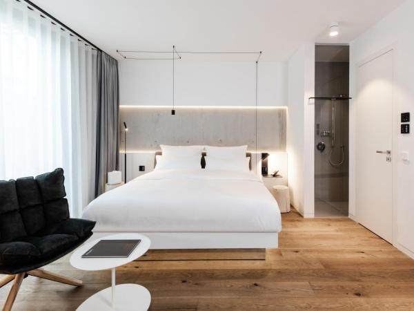 KPM Hotel & Residences : photo 2 de la chambre chambre deluxe avec coin salon