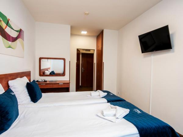 Sanatorium Uzdrowiskowe Bałtyk : photo 3 de la chambre chambre double ou lits jumeaux