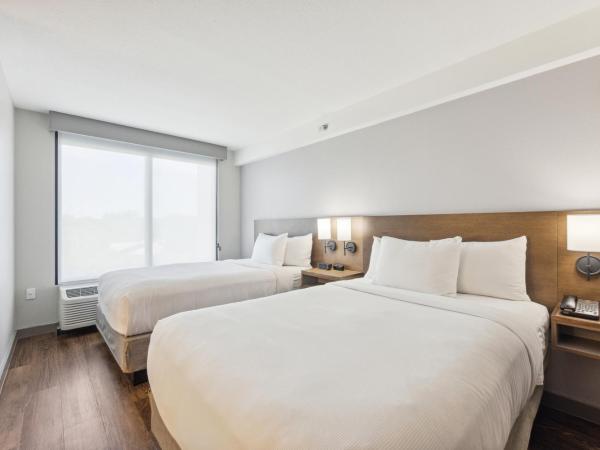 Hyatt Place San Antonio Northwest/Medical Center : photo 1 de la chambre chambre avec 2 lits doubles et canapé-lit