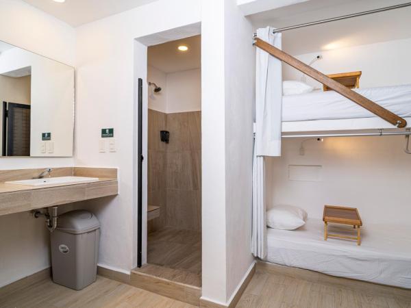 Nomads CoLiving : photo 6 de la chambre lit simple dans dortoir pour femmes