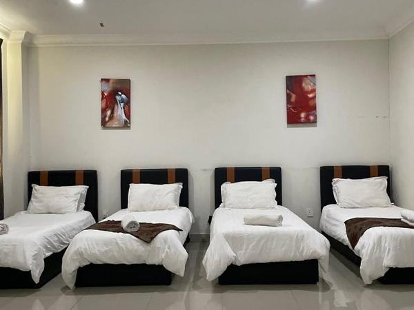 Hotel Mutiara KGMMB : photo 2 de la chambre dortoir mixte de 4 lits