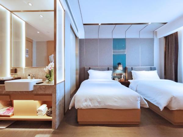 Paco Hotel Guangzhou South Railway Station Panyu Changlong Branch : photo 3 de la chambre chambre double