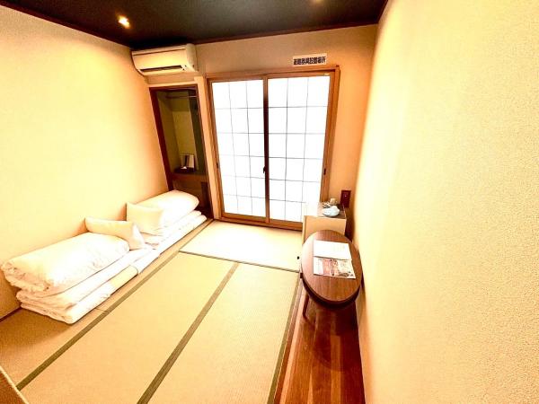 Seiki Kyoto Station : photo 1 de la chambre chambre quadruple avec salle de bains privative