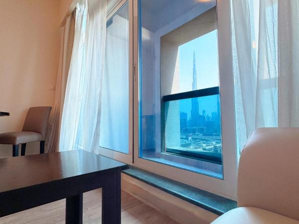 Emirates Grand Hotel : photo 3 de la chambre deluxe king room with burj khalifa view