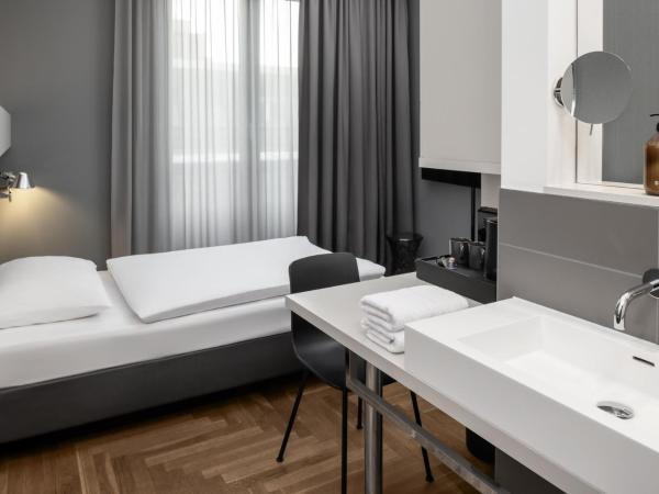 Hotel AMANO Rooms & Apartments : photo 1 de la chambre chambre simple Économique