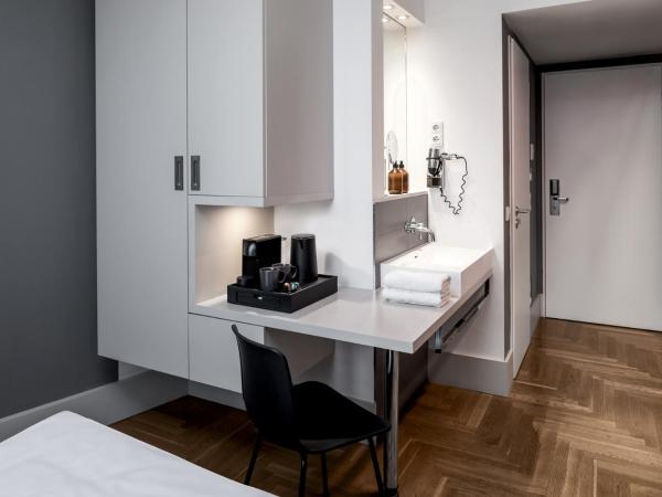 Hotel AMANO Rooms & Apartments : photo 2 de la chambre chambre simple Économique