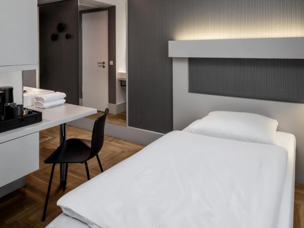 Hotel AMANO Rooms & Apartments : photo 3 de la chambre chambre simple Économique