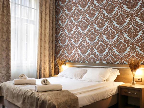 Hotel Lothus : photo 1 de la chambre chambre supérieure lit queen-size