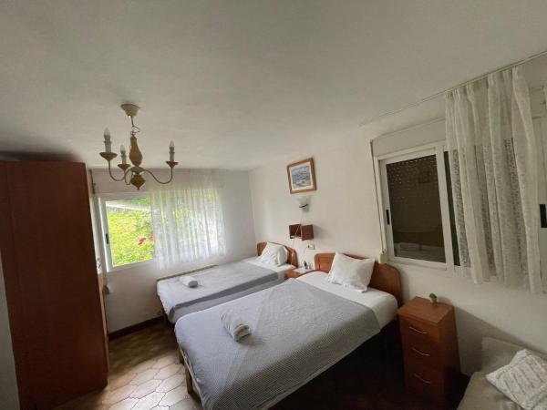 Pensión Tximistarri : photo 4 de la chambre chambre lits jumeaux avec salle de bains commune