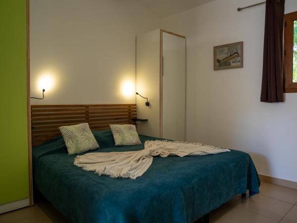 Résidence Sophia : photo 4 de la chambre maison (2 adultes + 2 enfants) avec terrasse - vue sur jardin