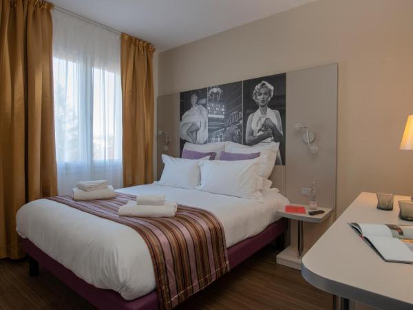 Hôtel Arles Plaza : photo 3 de la chambre suite en duplex