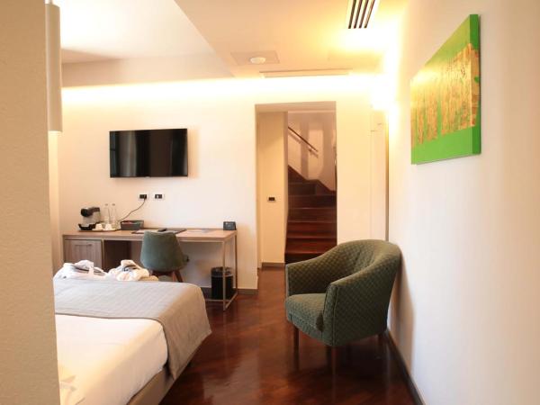 Le Cappuccinelle Suites&SPA : photo 9 de la chambre chambre lit king-size deluxe