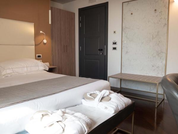 Le Cappuccinelle Suites&SPA : photo 4 de la chambre chambre lit king-size deluxe