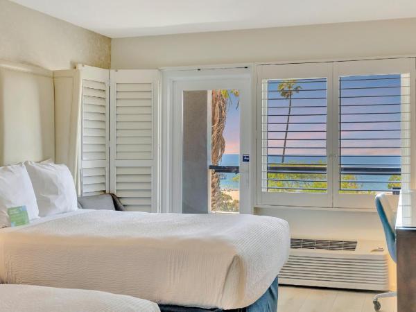 Ocean View Hotel : photo 4 de la chambre chambre double de luxe avec deux lits doubles - vue sur l'océan