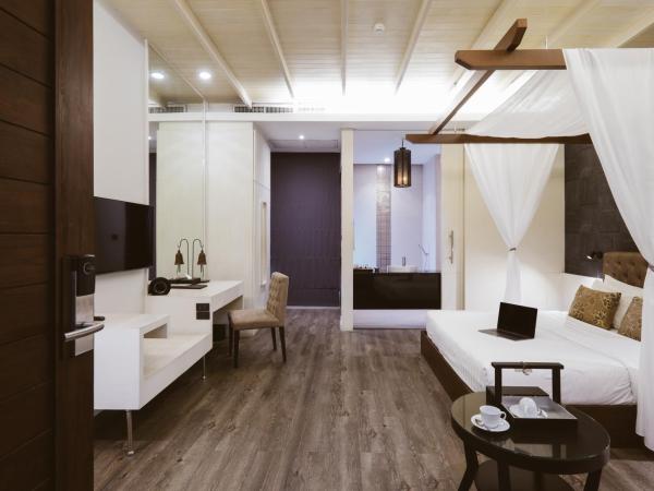 De Chai Colonial Hotel & Spa - SHA Plus : photo 4 de la chambre grande chambre double ou lits jumeaux deluxe