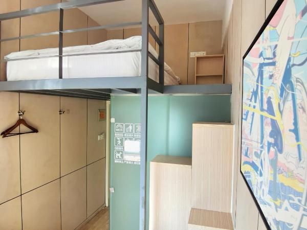 Yozo Serviced Apartment : photo 1 de la chambre studio avec mezzanine