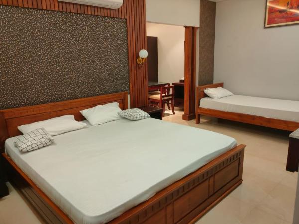 ROYES PARK ROOMs & MINI PARTY HALL : photo 2 de la chambre suite