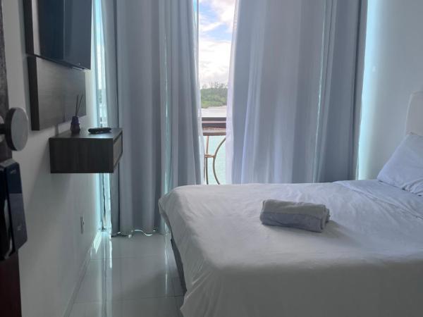 Pousada Seven Sunset Club Marambaia : photo 3 de la chambre suite lit queen-size – vue sur mer