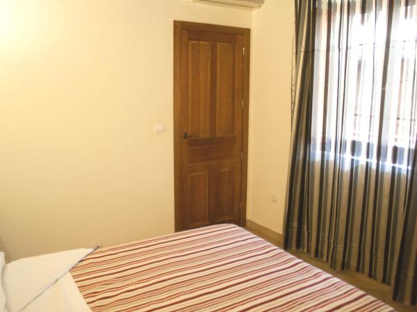 Abadia Suites : photo 6 de la chambre chambre triple