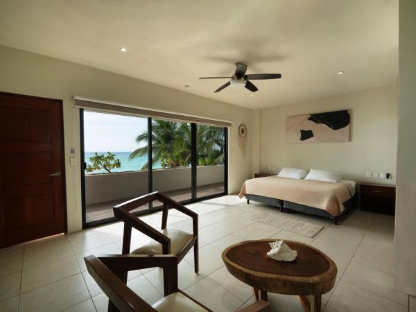 Cuxos Hotel Beachfront : photo 3 de la chambre chambre lit king-size - vue sur mer