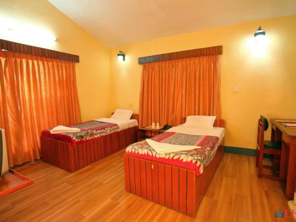 Hotel Melungtse & Apartmentent : photo 2 de la chambre chambre lits jumeaux